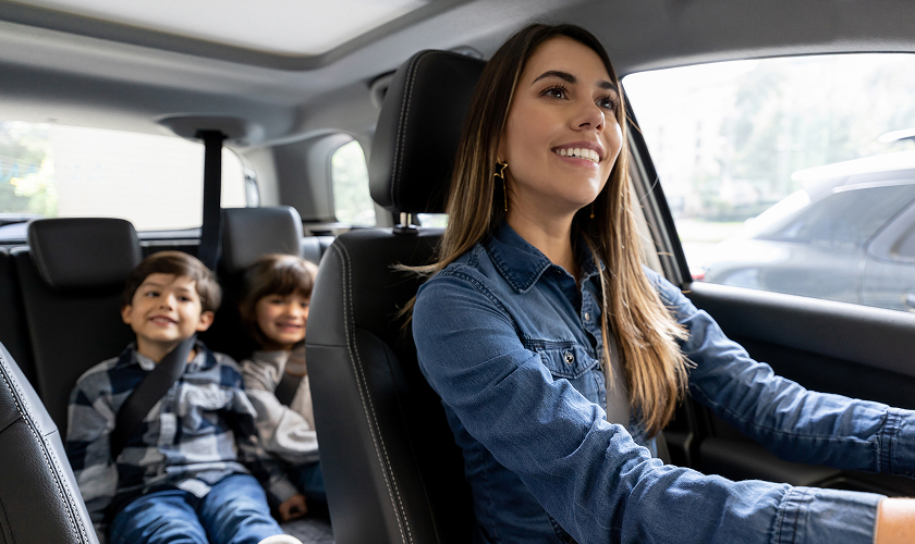 mom driving kids to dentist