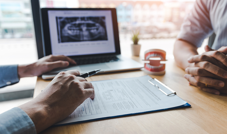 a person going over paperwork
